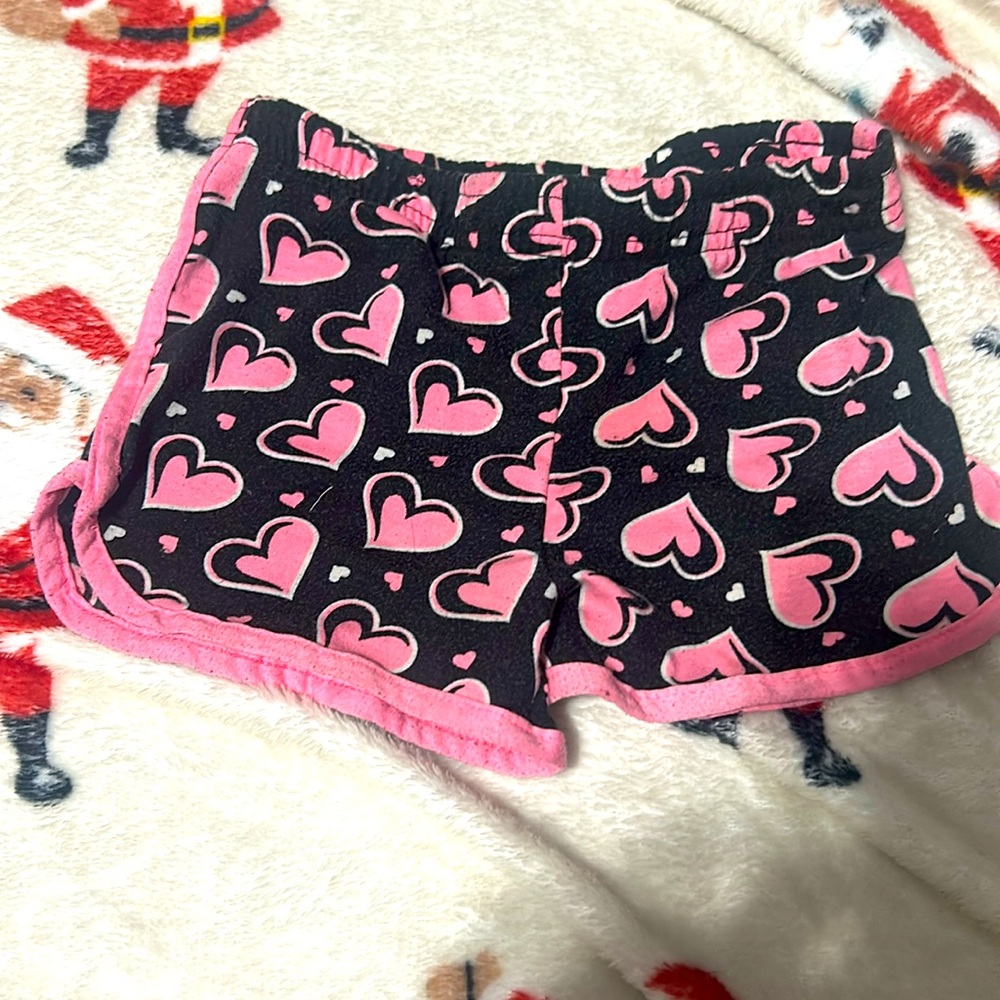 Little girl, heart shorts
